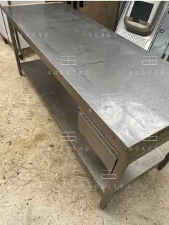 Használt rozsdamentes asztal alsó polccal és fiókkal